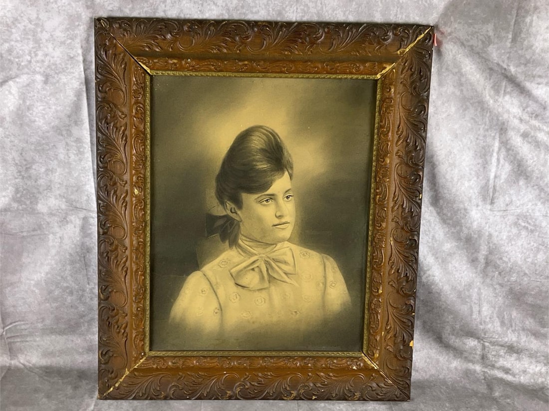 Victorian Lady Portrait: Late 19th century framed hand tinted charcoal style photographic portrait. Original period gesso frame and glass with cardboard backing. Some losses to frame, otherwise portrait in good condition.