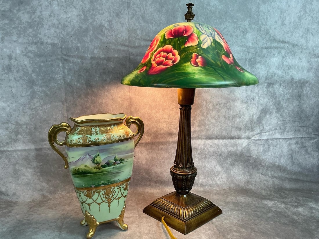 Nippon Vase & Art Nouveau Lamp: Early century vase and late century lamp. Nippon vase with “Mount Fuji” hand painted landscape scene and delicate gilt decoration. Tiffany style lamp with metal base and plastic lampshade.