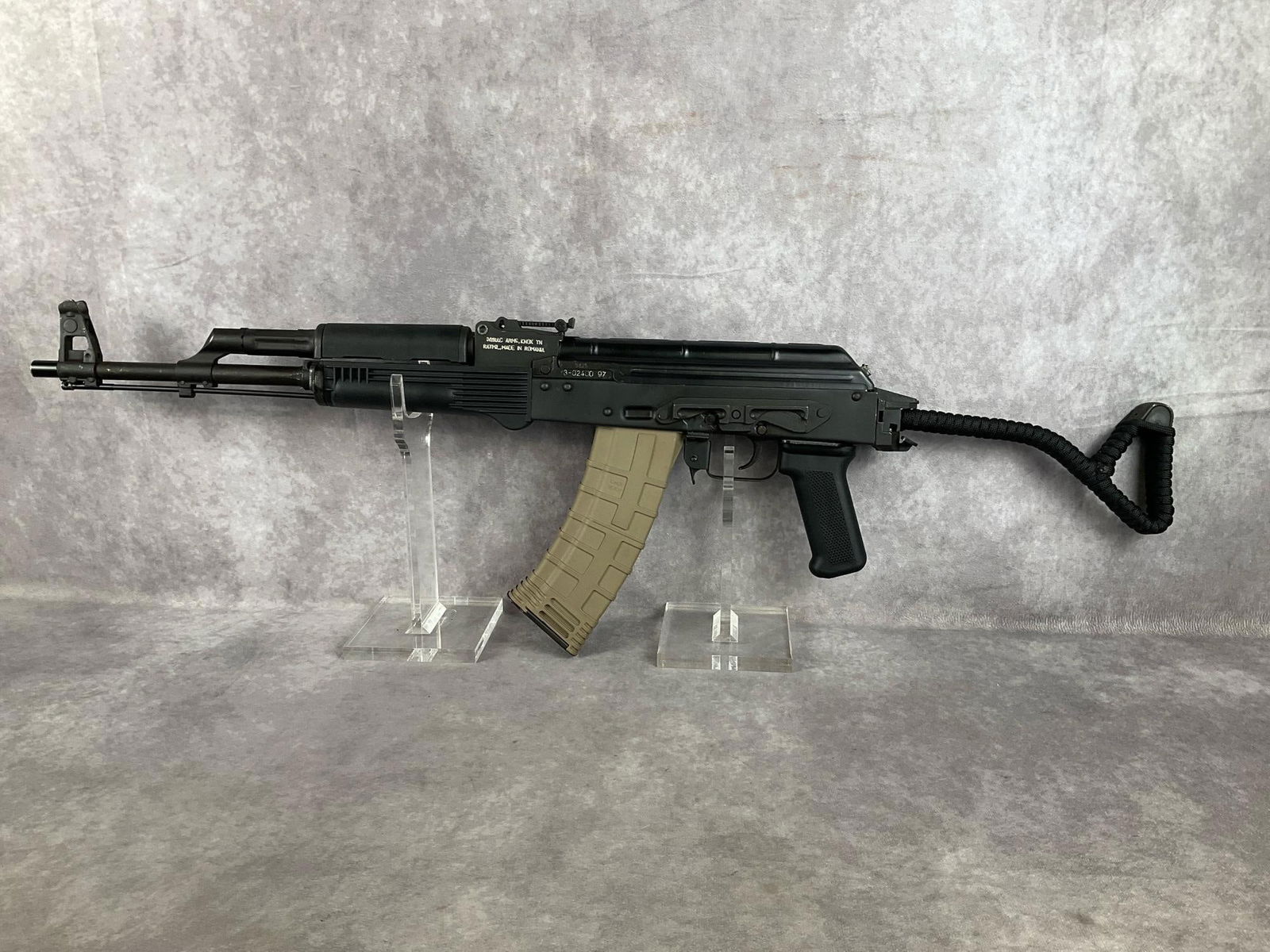 Romanian CUR 2 AK 74: Serial # 3-02400 97, Caliber 5.45 X 39 mm. Equipped with Polish military black ABS furniture and folding stock. Includes original wood furniture, magazine and sling. Has a soft carrying case and four