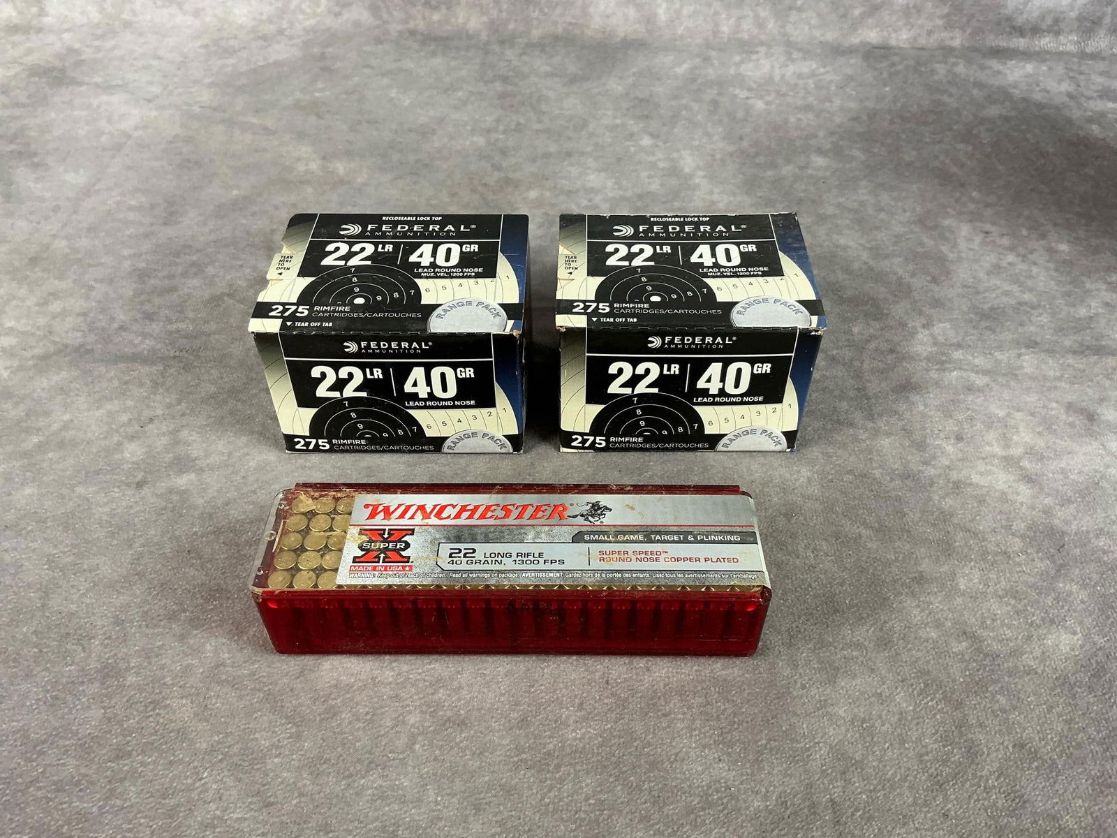 Federal and Winchester 22 Long Rifle Ammunition: 600 total rounds. 40 GR Unopened boxes. Largest box measures 3.5 inches long X 3 inches wide X 2.5 inches high.