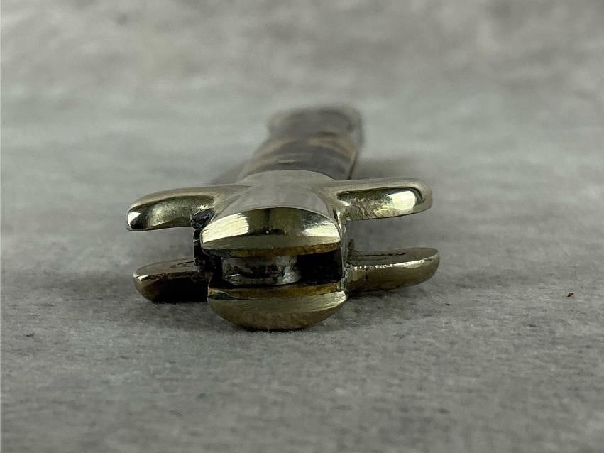 Case XX Bowtie Knife: Case No. 7 1051. Made in Germany out of shell. Appears never carried, sharpened, with appropriate snap. Good condition. Measures 4 inches wide.