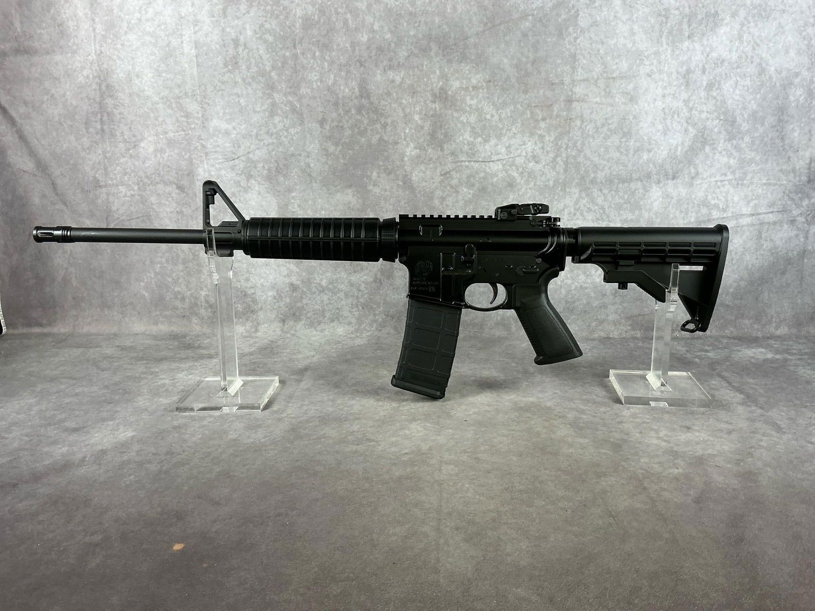 Ruger AR-556 5.56 Nato Caliber Semi-Auto Rifle: Serial # 857-52525 AR 556 New never fired and in very good condition. Barrel length 16 inches, overall length 32.5 inches, stock extended 35.5 inches.