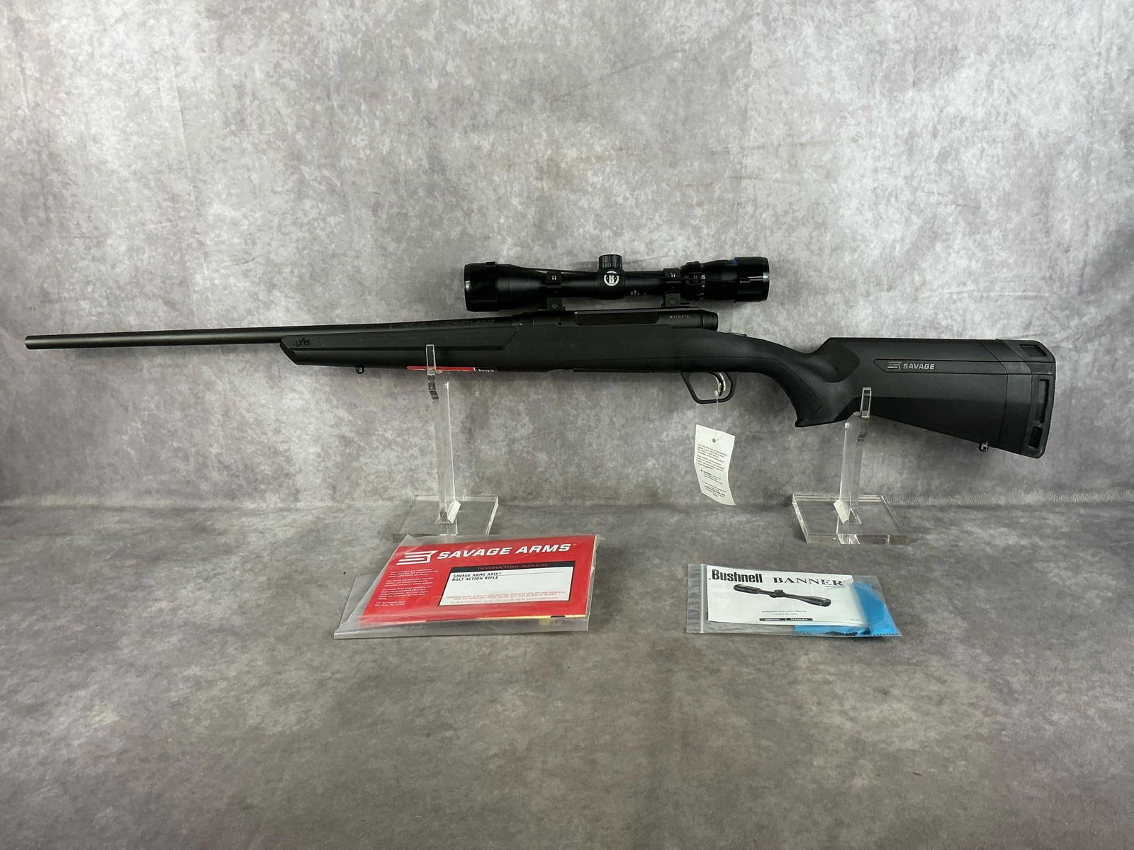 Savage Axis .243 Caliber Rifle: Serial # N176476 New never fired and in very good condition. Equipped with a Bushnell 3-9 X 40 scope. Barrel length 22 3/4 inches overall length 42.5 inches.