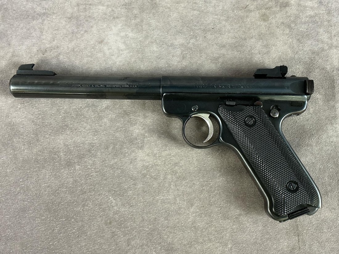 Ruger Mark II Target 22 Long Rifle Pistol: Serial # 210-28804 Heavy Barrel. Looks to have been rarely fired. Clean bore and in good condition. Includes original box. Barrel length 6 3/4 inches , overall length 11 inches.