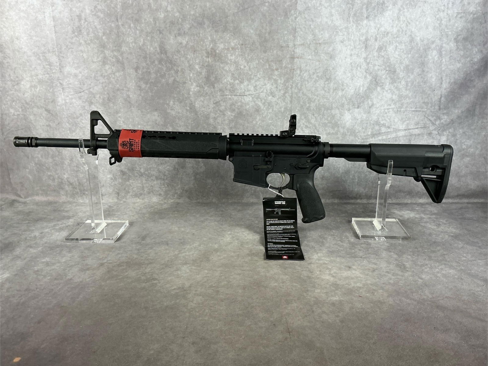 Springfield Armory Saint 5.56 Caliber Rifle: Serial # 05883 Saint 5.56 very good condition, never fired. No magazine. Barrel length 18 inches, overall length 33.5 inches, stock extended 35.5 inches.