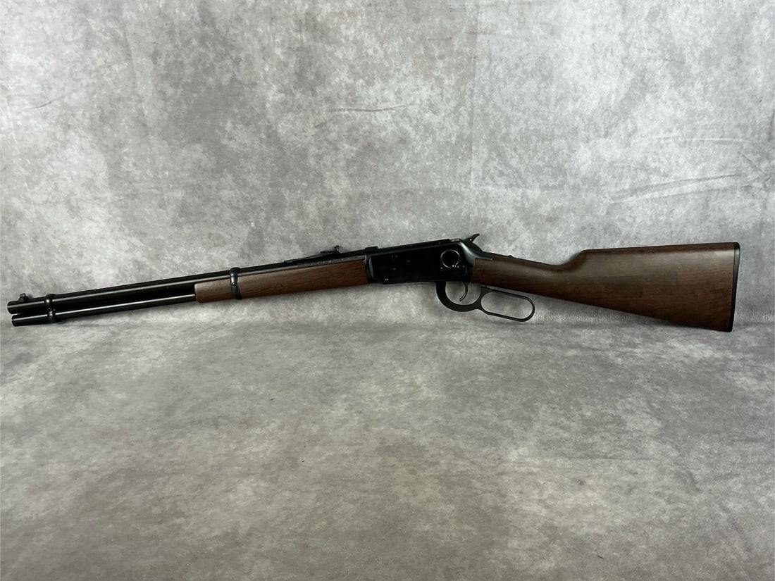 Winchester Model 94AE 45 Colt Rifle: Serial # 6526201 lever action rifle. Looks to have been never fired and in very good condition. Barrel length 20 inches, overall length 37.75 inches.