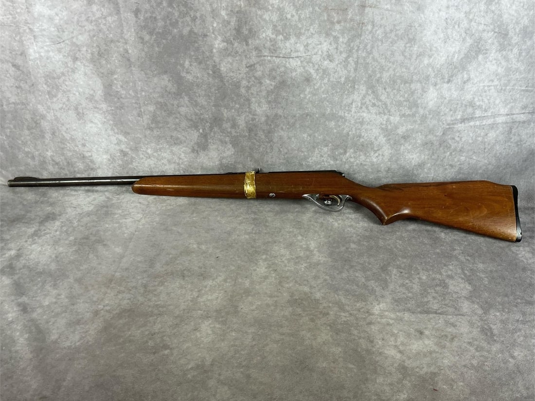 Sears & Roebuck 22 LR Bolt Action Rifle: Serial # DLA-1032751 Model 41A Single shot. Barrel has signs of rust and stock is scratched and marred. Barrel length 22 inches, overall length 39.5 inches.