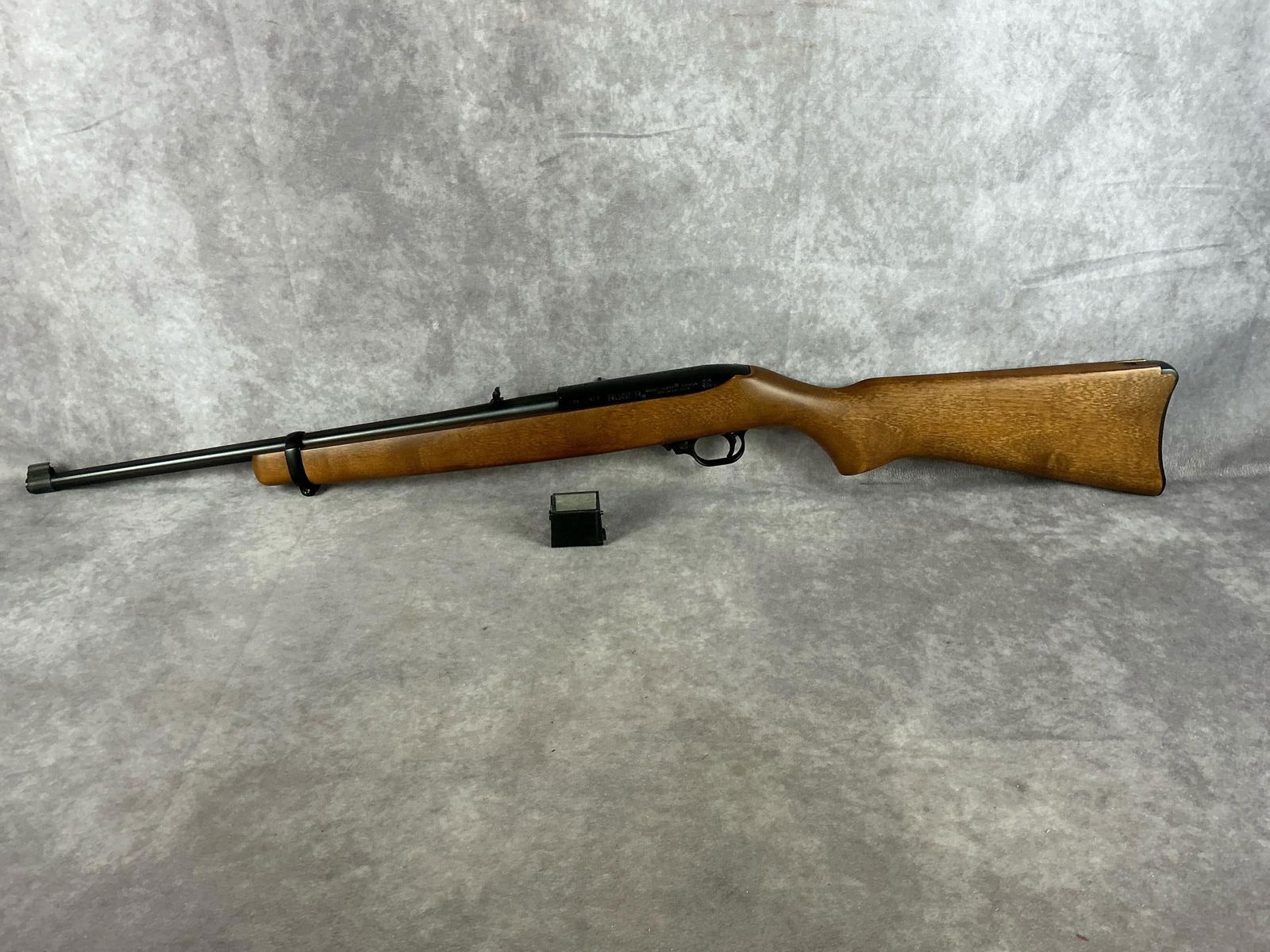 Ruger 10/22 22LR Semi-Auto Rifle: Serial # 129-17917 10/22 in very good condition. Includes extra magazine. Barrel length 18.5 inches, overall length 37 inches.