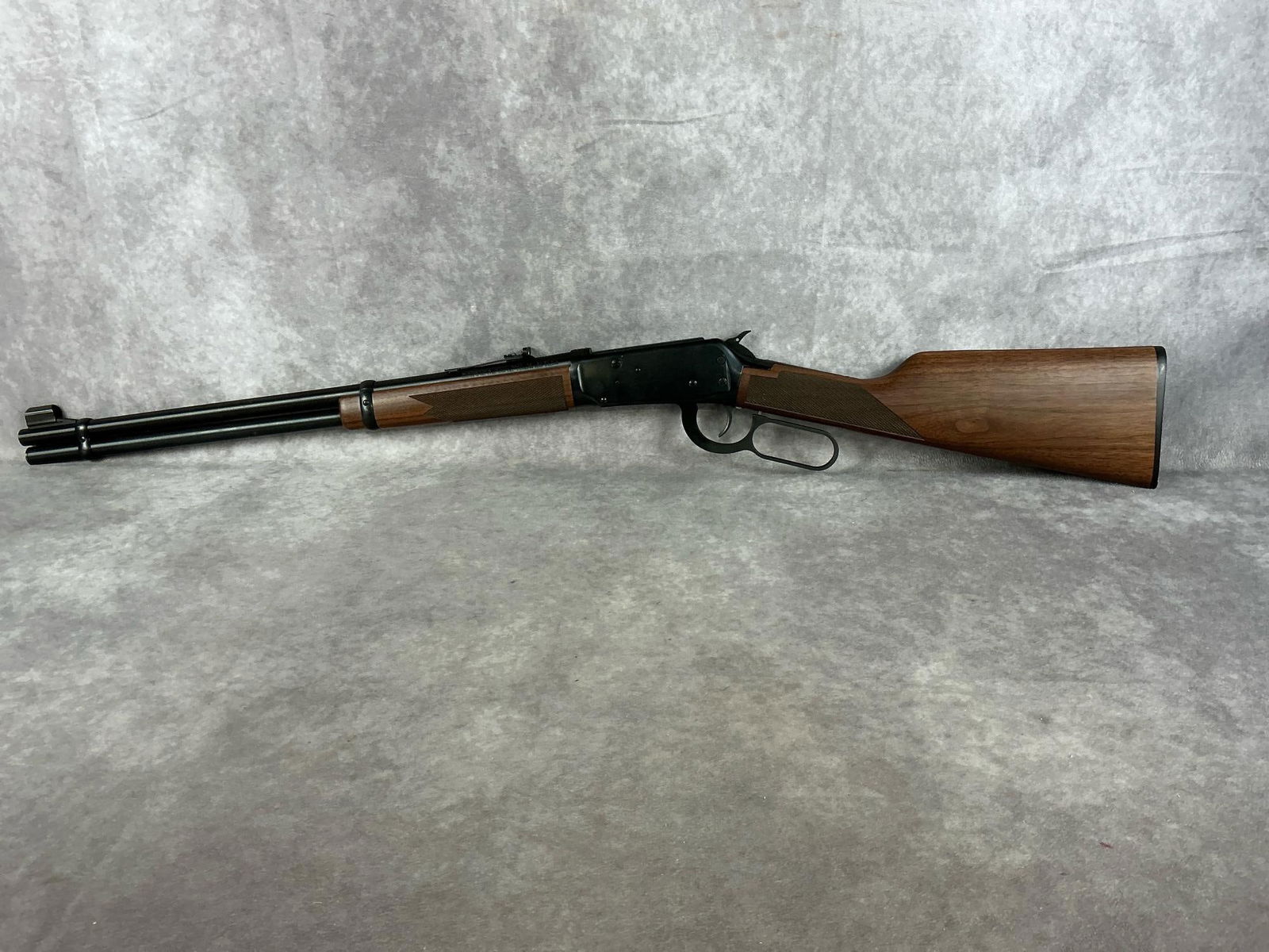 Winchester Model 94AE 30/30 Rifle: Serial # 6485154 lever action rifle. Looks to have never been fired and in very good condition. Barrel length 20 inches, overall length 37.75 inches.
