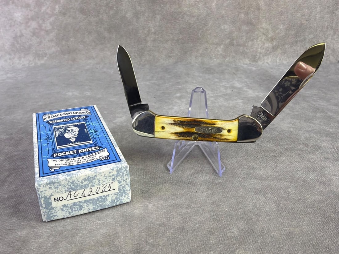 W.R. Case & Sons Knife: W.R. Case and Sons stag Canoe pocket knife. Tight snap and never sharpened. Pattern number 52131 ss. Comes in original box and measures 3.75 inches closed.