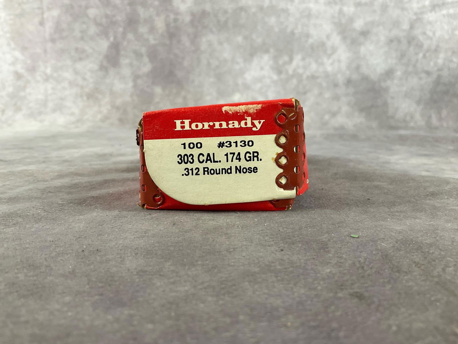 Hornady 303 Cal Bullet: 1 box quantity 100. #3130 174 GR .312 round nose bullet. In good condition. Box measures 4.75 inches long X 2.25 inches wide X 1.5 inches high.