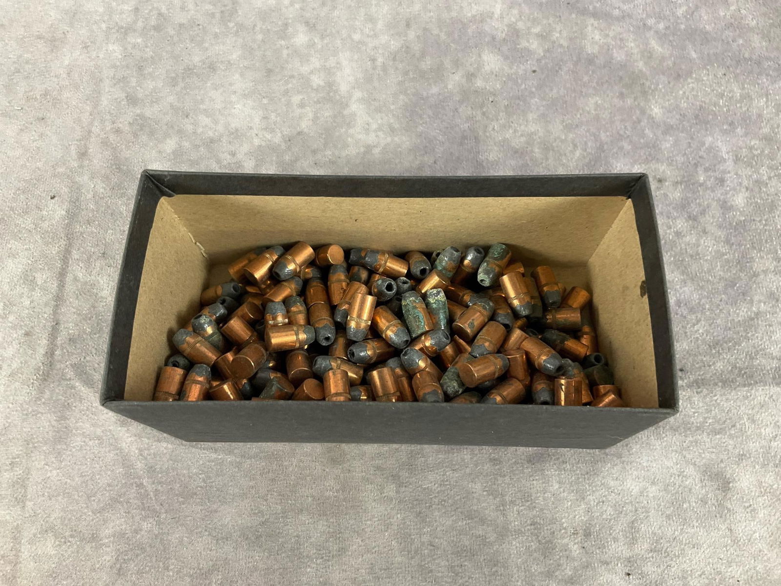 9 MM bullet: 200 total 155 GR hollow point bullet. Unknown manufacture. Some corrosion to be found across lot. Otherwise in good condition. Box measures 7 inches long X 3 inches wide X 3 inches high.