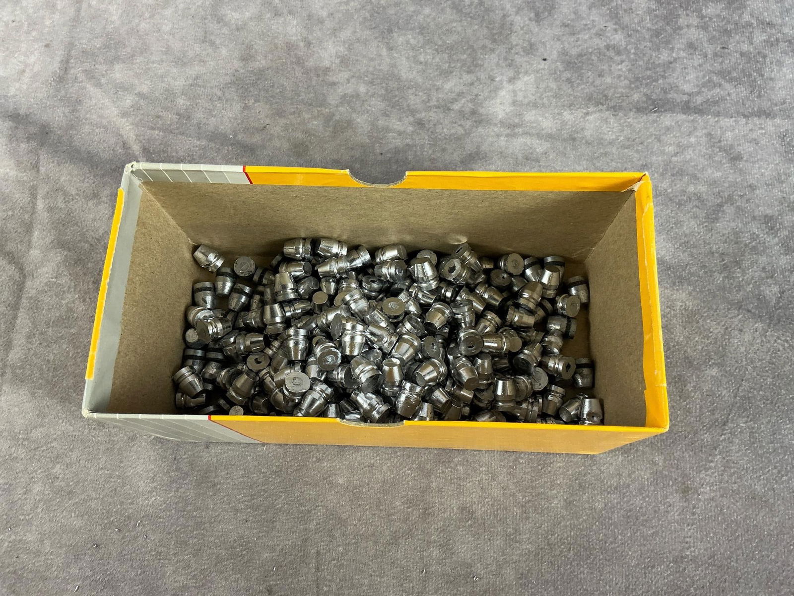 9MM Hand Cast Bullet: 265 total 100 GR semi-wadcutter bullet. Box measures 7 inches long X 3 inches wide X 3 inches high.