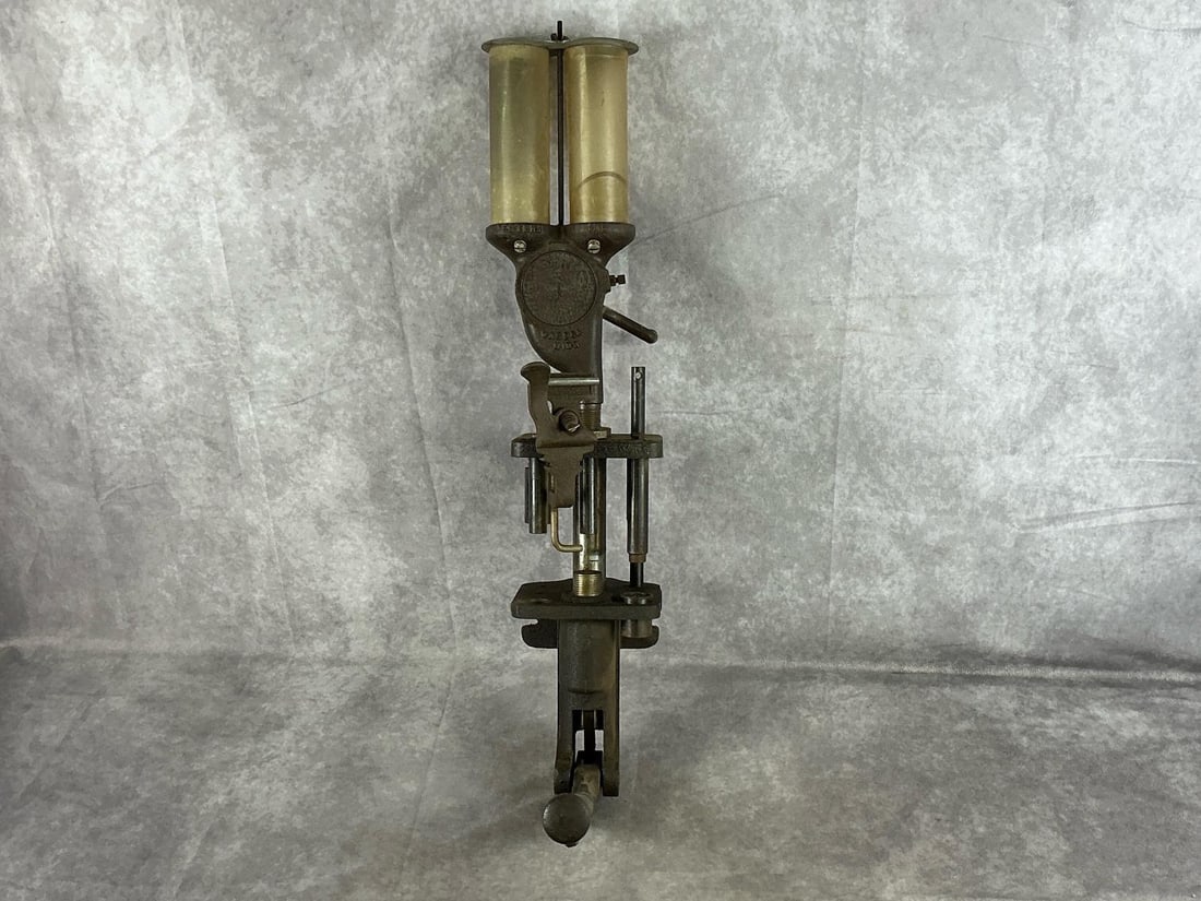 Herters Shot Shell Press: Model 72 vintage press set up for 20 Ga Shells. Working condition. Press measures 27 inches high X 16 inches long X 6 inches wide.