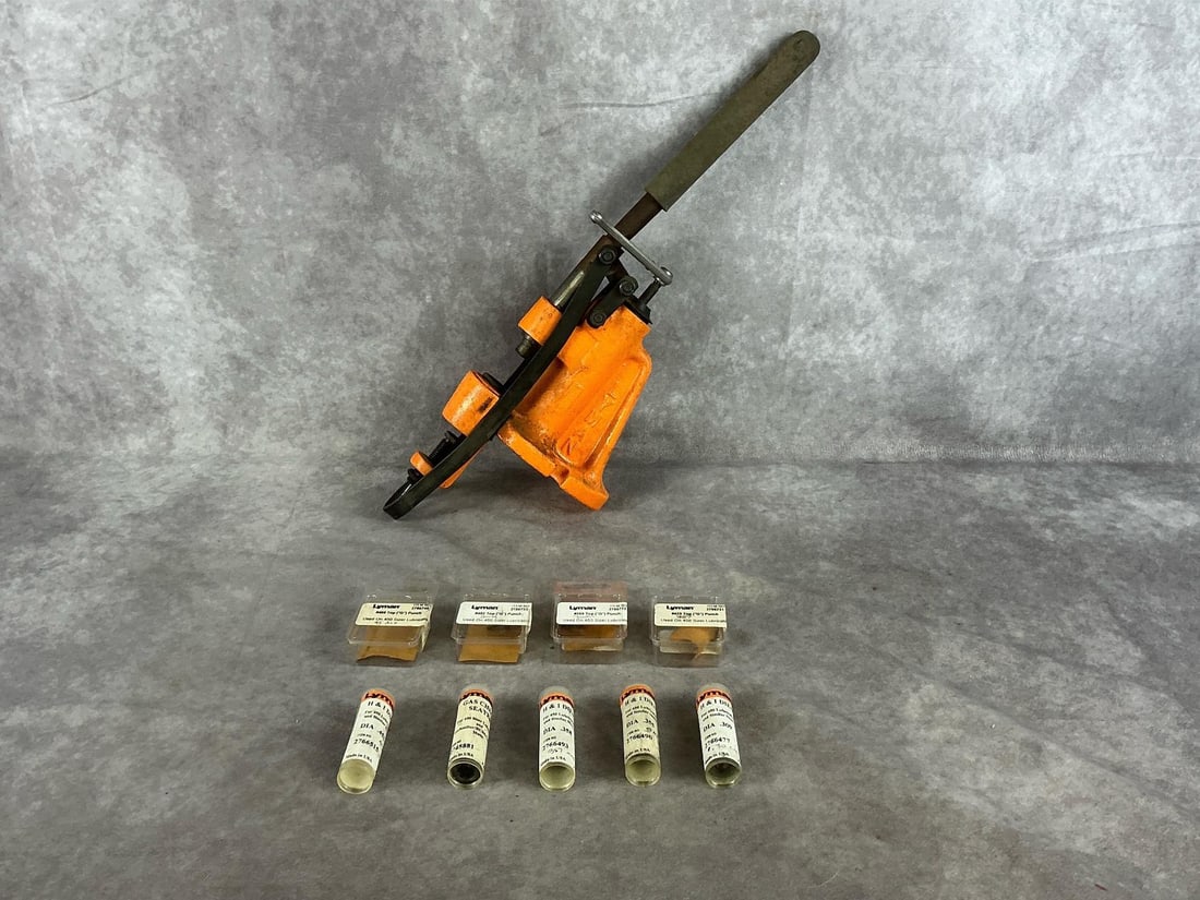 Lyman Cast Bullet Lubricator: Model 450 lubricator and sizer. Measures 16 inches long X 6 inches wide X 3.5 inches high.