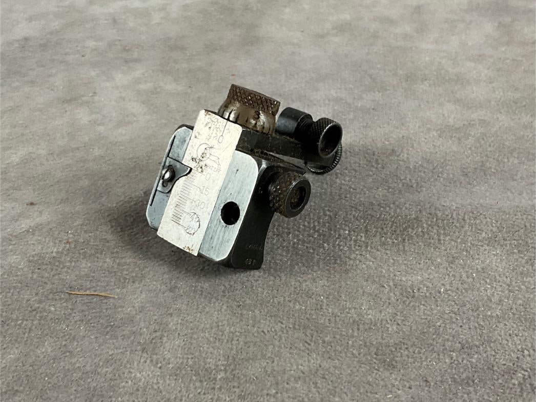 Lyman Peep Sight: Number 48 FH vintage peep sight. Measures 1.75 inches long X 1.5 inches wide X 1.5 inches high.