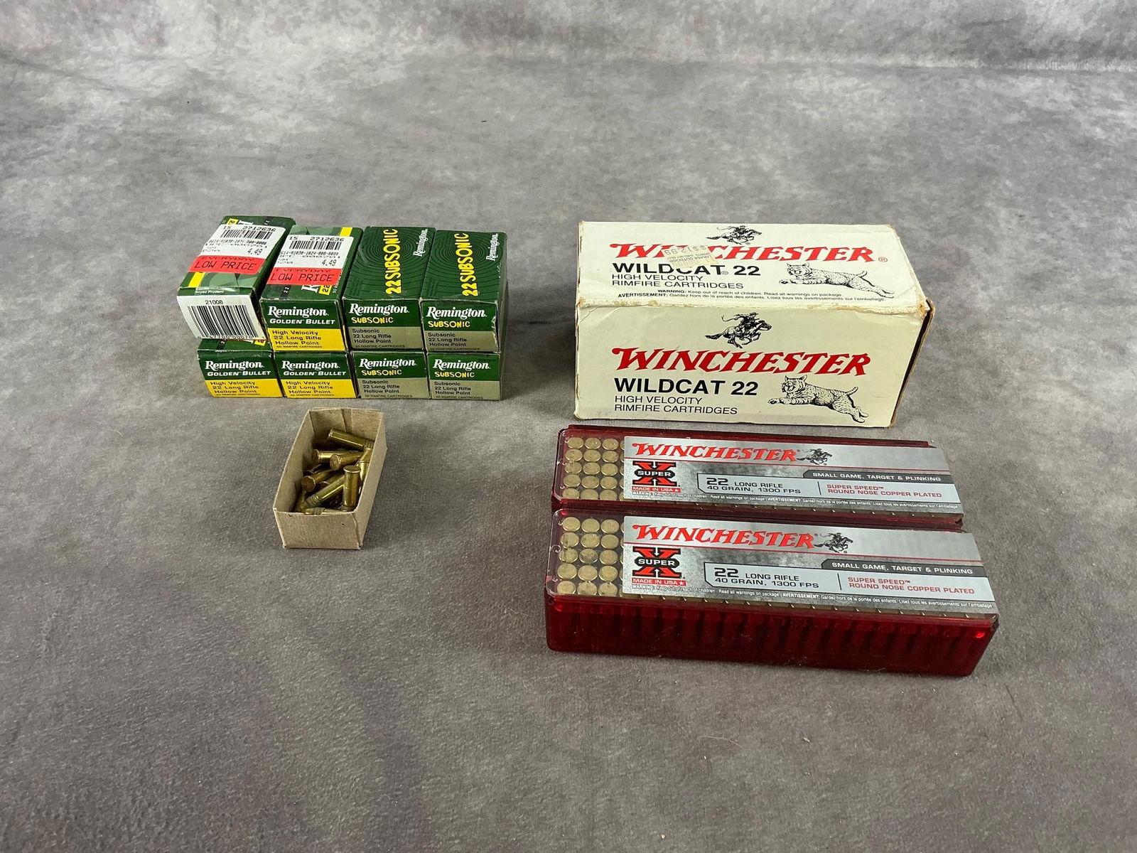 Remington and Winchester 22 Long Rifle Ammunition: 1120 rounds total. 36 GR and 40 GR. Largest box measures 5.5 inches long X 2.5 inches wide X 2.5 inches high.