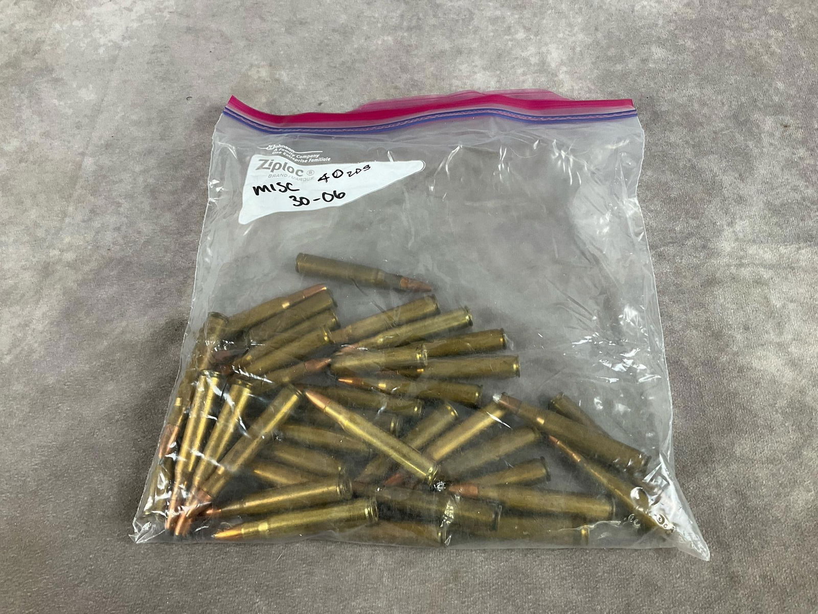 Miscellaneous Remington, Winchester Etc. 30-06 Ammunition: 40 total rounds in fair condition. Bag measures 10 inches long X 10 inches wide X 2 inches high.