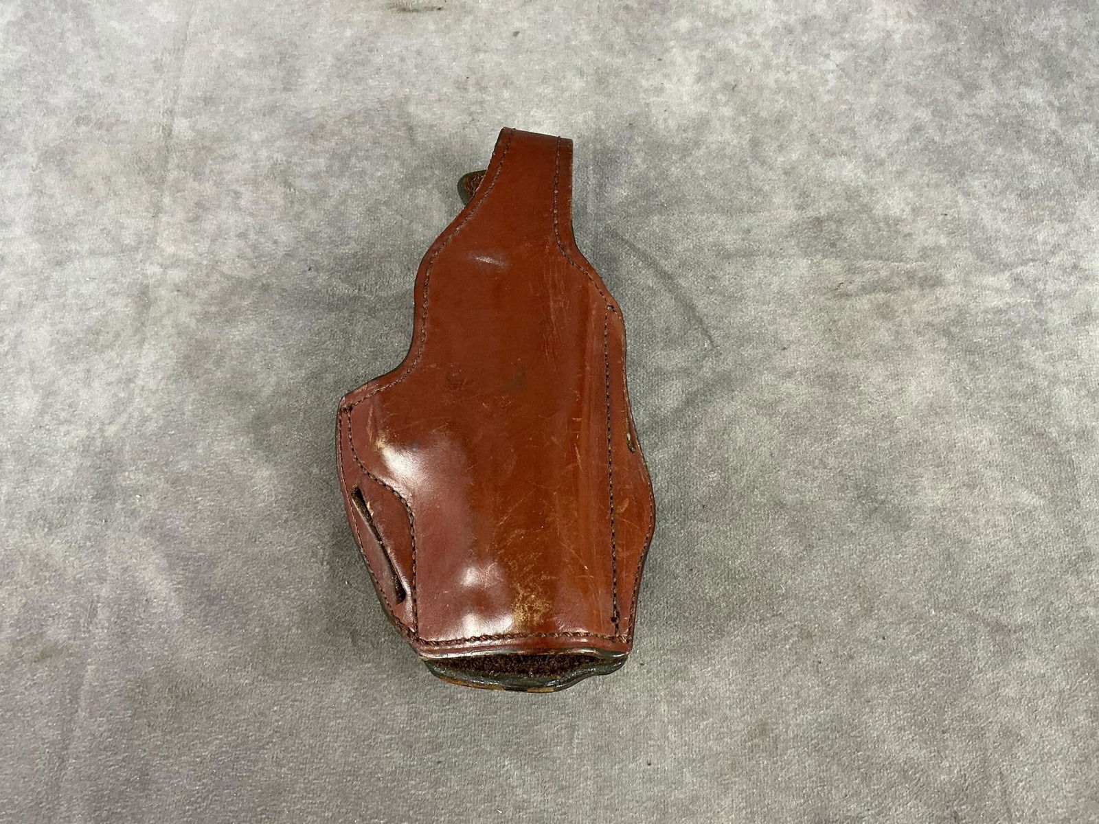 Gould & Goodrich Holster: Leather # 590 size 29 l. Used and in fair condition. Measures 9 inches long X 4.5 inches wide X 2 inches high.