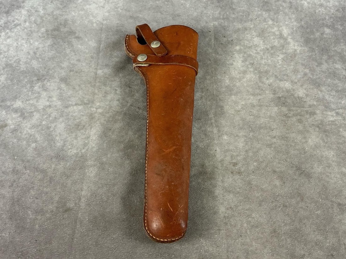 Hunter Leather Holster: Model # 1100 51 long barrel revolver. Used and in good condition. Measures 13.5 inches long X 5 inches wide X 2 inches high.