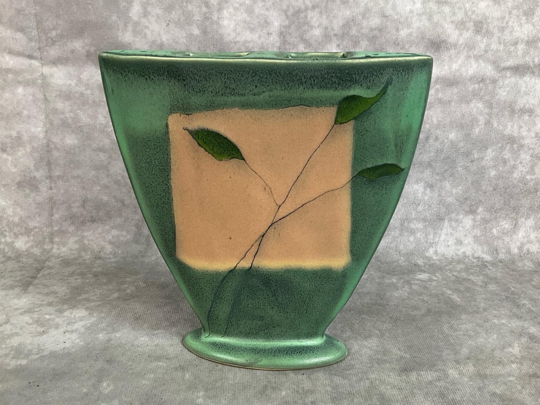 Polseno Pottery Vase: Modern age vase. Green and brown art vase by Donna Polseno Pottery. In good condition. Measures 6.5 inches wide x 1.5 x 6 inches tall.