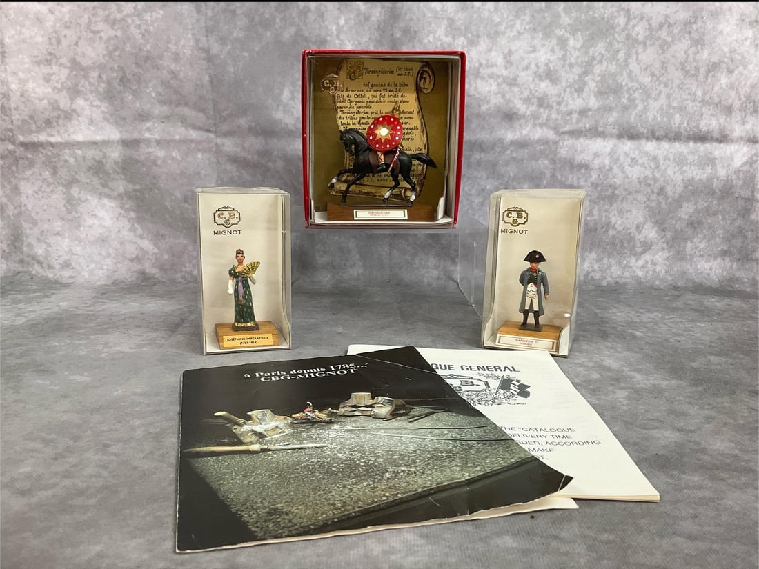 C B G Mignot Lead Figures: Three mid century figures. French made hand painted miniature lead figures by CBG Mignot. Includes Chieftain Vercingetorix on horseback, Napoleon, and Josephine figures in original packaging. In good
