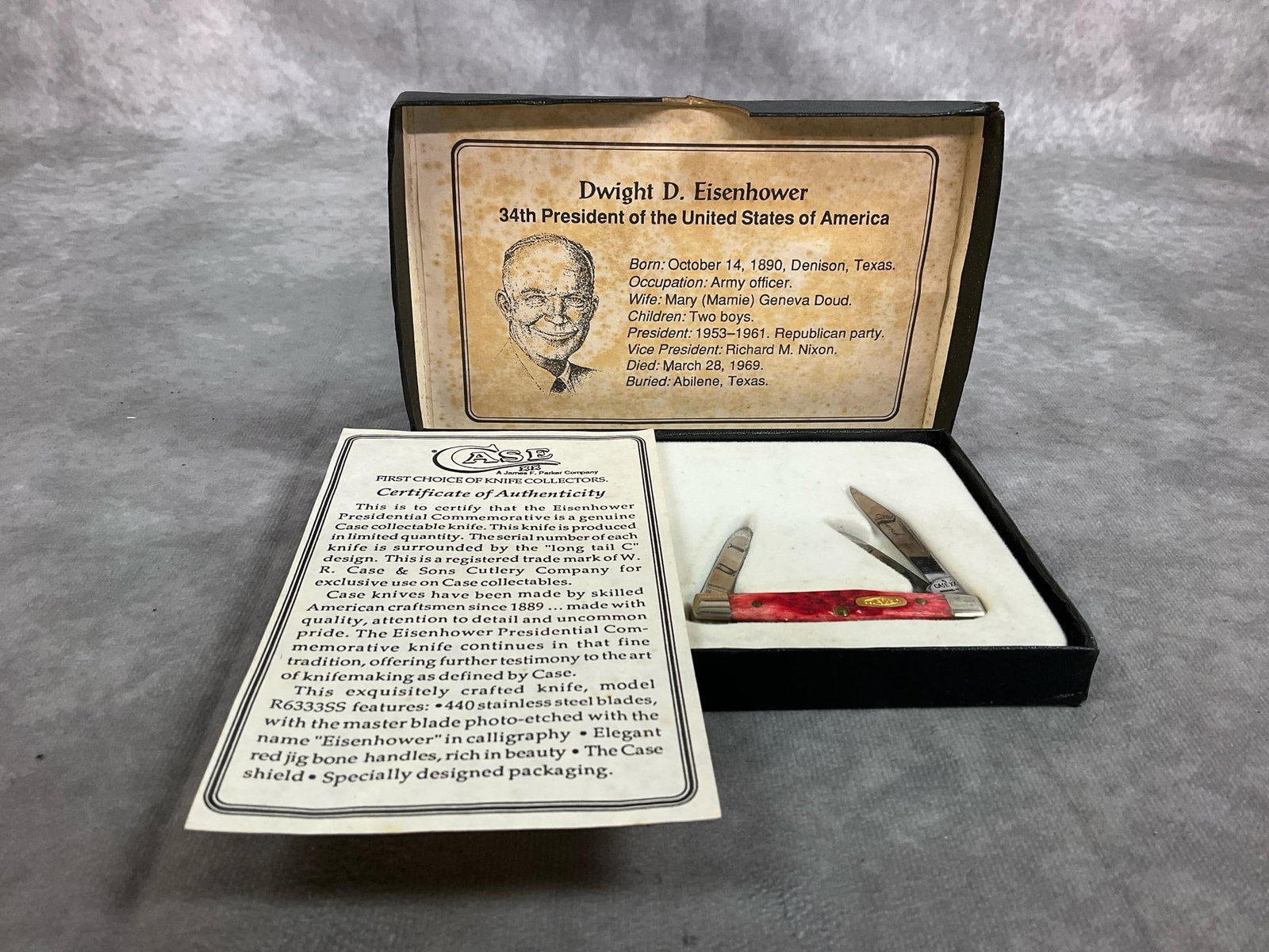 Eisenhower Case Knife: Late century collectible knife. Commemorative pocket knife with red bone handle. Includes certificate of Authenticity and information on President Eisenhower. Good condition. In original box,