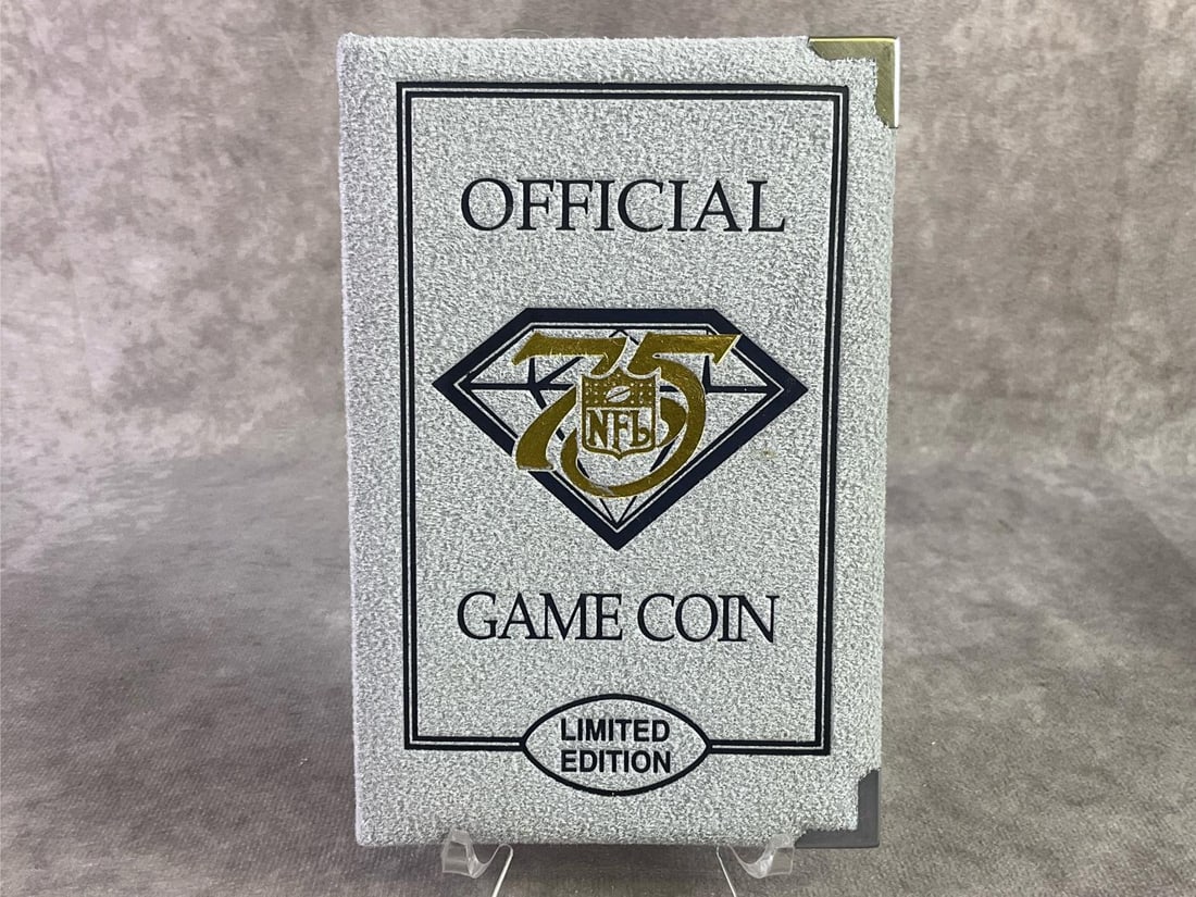 Official NFL Game Coin: Official NFL 75th Anniversary Tribute Coin, 1933 Philadelphia Eagles Inaugural Season. Number 911 of 7500, in good condition with original box and COA. Coin contains 1oz of 999 sterling silver.