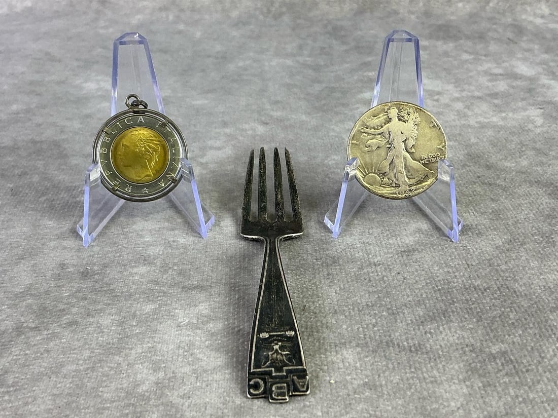 Silver Finds: 1942 Walking Liberty, genuine Italian 500 Lire with stamped silver bezel, and children's sterling fork. All in good condition. Total weight 1.15ozt.