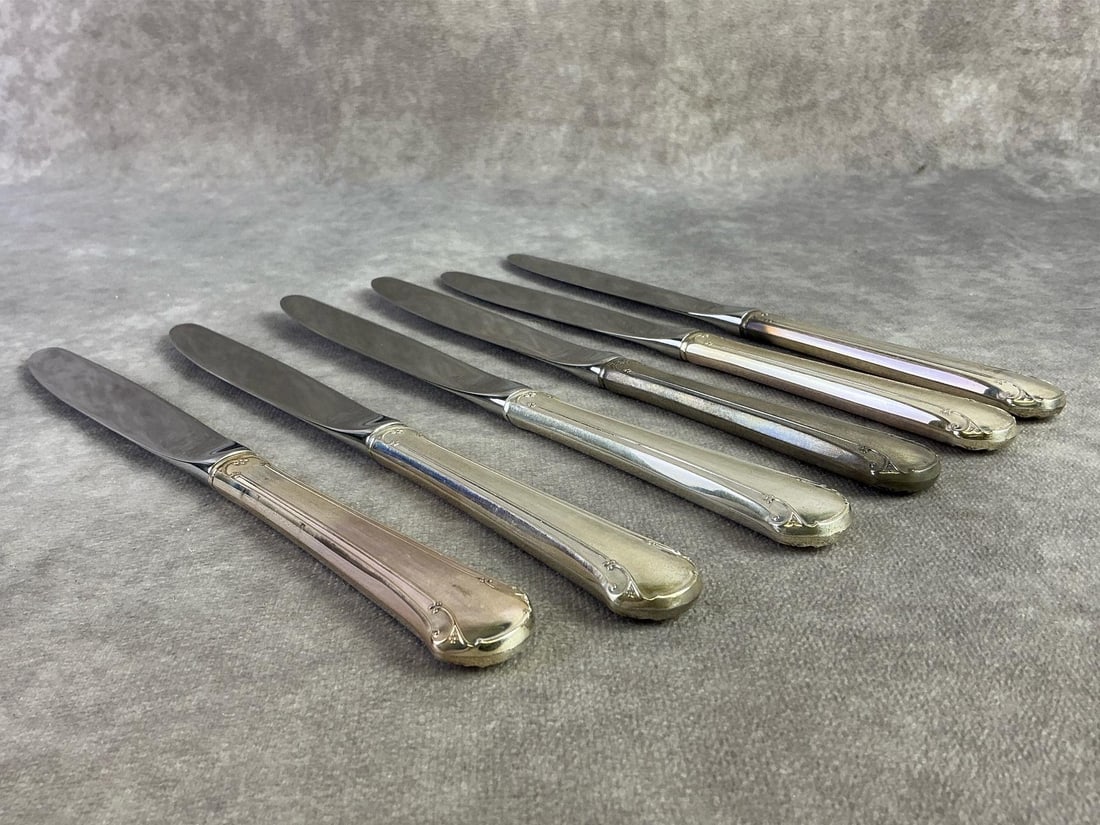 Towle Sterling Butterknives: Lot of six Towle Sterling silver butter knives with blade being stainless steel. All new old stock with original plastic, unsealed for weight purposes. Stamped and pattern Chippendale. Total weight