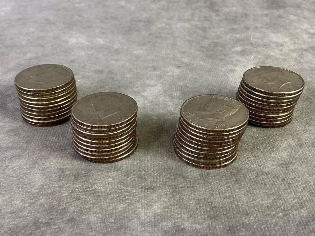 1972 Kennedy Halves: Lot of fourty 1972 Kennedy Half Dollar coins. All in good circulated condition. Each measures 1.15 inches in diameter.