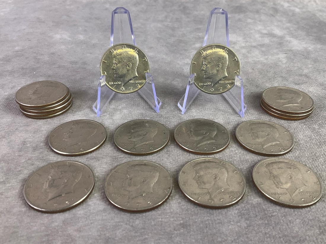 Kennedy Half Dollars: Lot of eighteen Kennedy half dollars. All in good circulated condition. Each measures 1.15 inches in diameter.