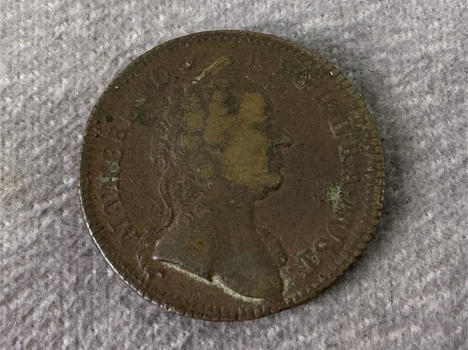 1762 Liard Coin: 1762 Liard coin from the Austrian Netherlands. In good circulated condition with obvious signs of age. Coin measures 1 inch in diameter.