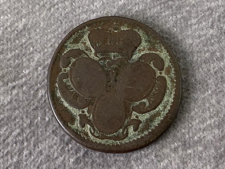 Bohemia Coin: 1767 Bohemia copper coin. In fair circulated condition while still being identifiable. Coin measures 0.75 inches in diameter.