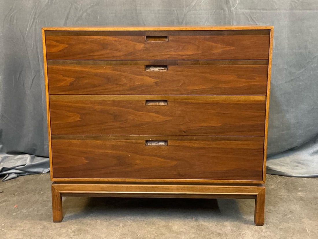 MCM Chest of Drawers: MCM circa 1960's walnut chest of four drawers. Good condition. Measures 33.75 inches wide x 18 x 31 inches tall.