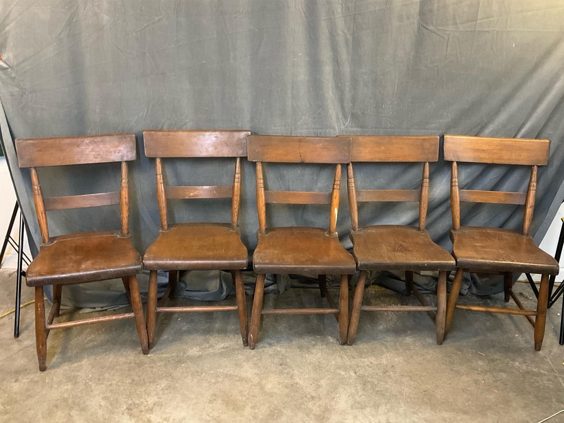 Plank Chairs: Mid 19th century set of five plank bottom side chairs with tablet crests. White discoloration to finish, otherwise good condition. Measures 16.25 x 15 x 33 inches tall.
