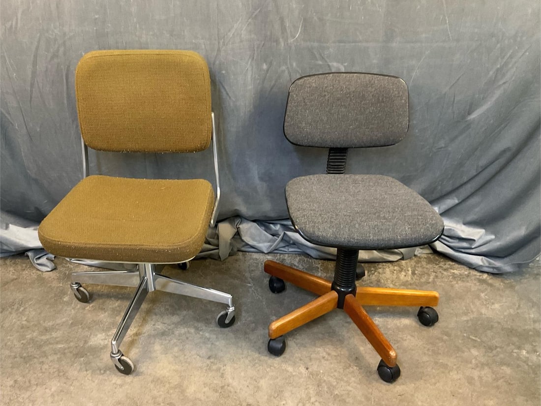 MCM Office Chairs: Two mid - twentieth century MCM style office chairs. One with tan fabric, chrome and adjustable seat height. One with grey fabric, wooden base and adjustable height and backrest. Small split to