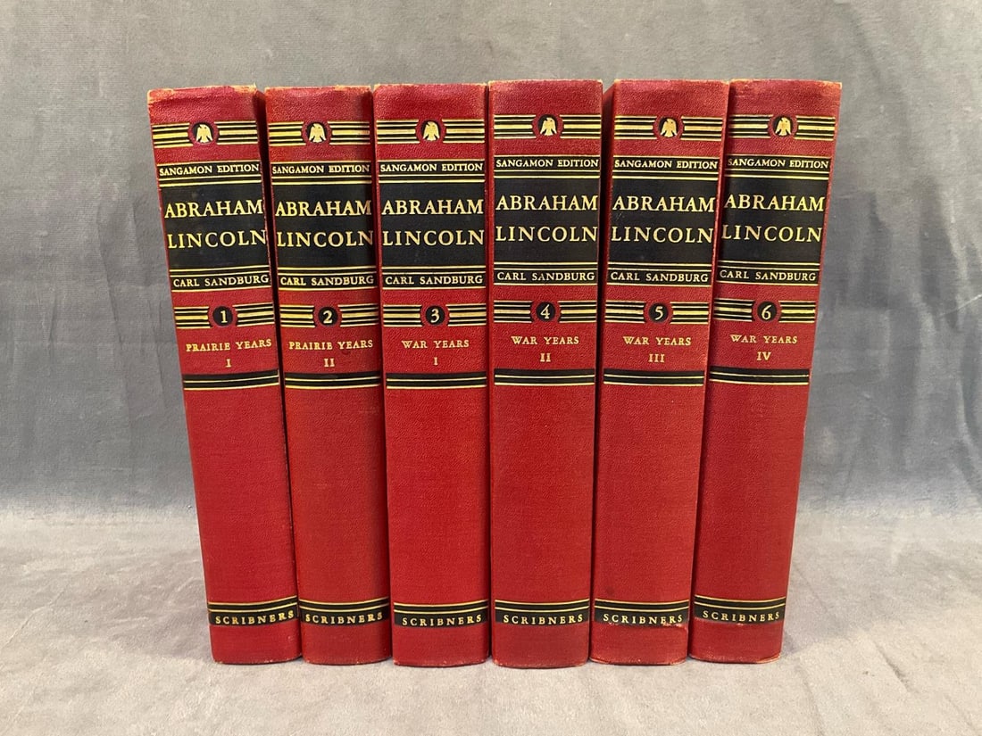 Book Set Abraham Lincoln: "Abraham Lincoln" by Carl Sandburg, 1926 - 1939,. New York: Charles Scribner's Sons. The Sangamon Edition, six volumes. Original red cloth with blind-stamped Lincoln profile on front covers, gilt and