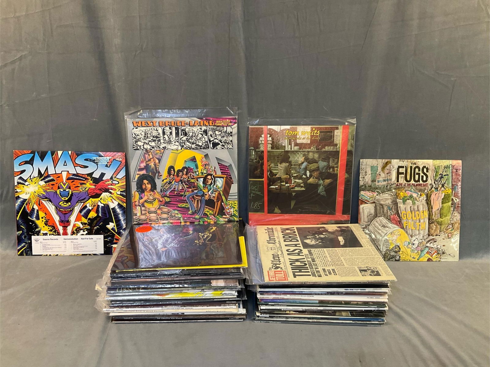 LP Rock Records: Approximately sixty five vintage ( mostly 1970's) collectible mostly rock albums. Featuring works by; Jethro Tull, Tom Waits, Kansas, The Village People, Pete Townsend, folk musician Pete Seeger, and