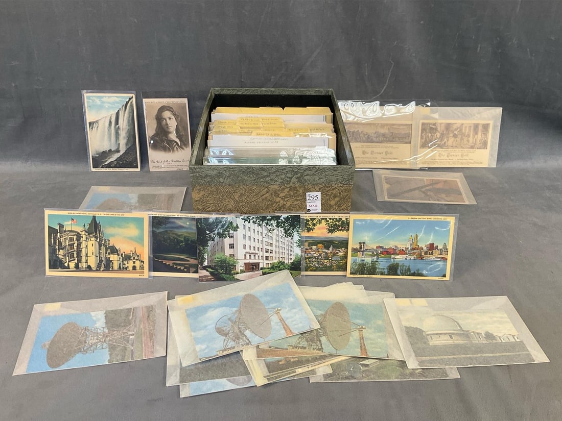 Approximately 50 Postcards: Approximately 50 postcards depicting advertising, movie stars, flags and more. All in good condition with some circulated and non. Box containing cards measures 8.25 inches wide x 11.75 inches x 6.5