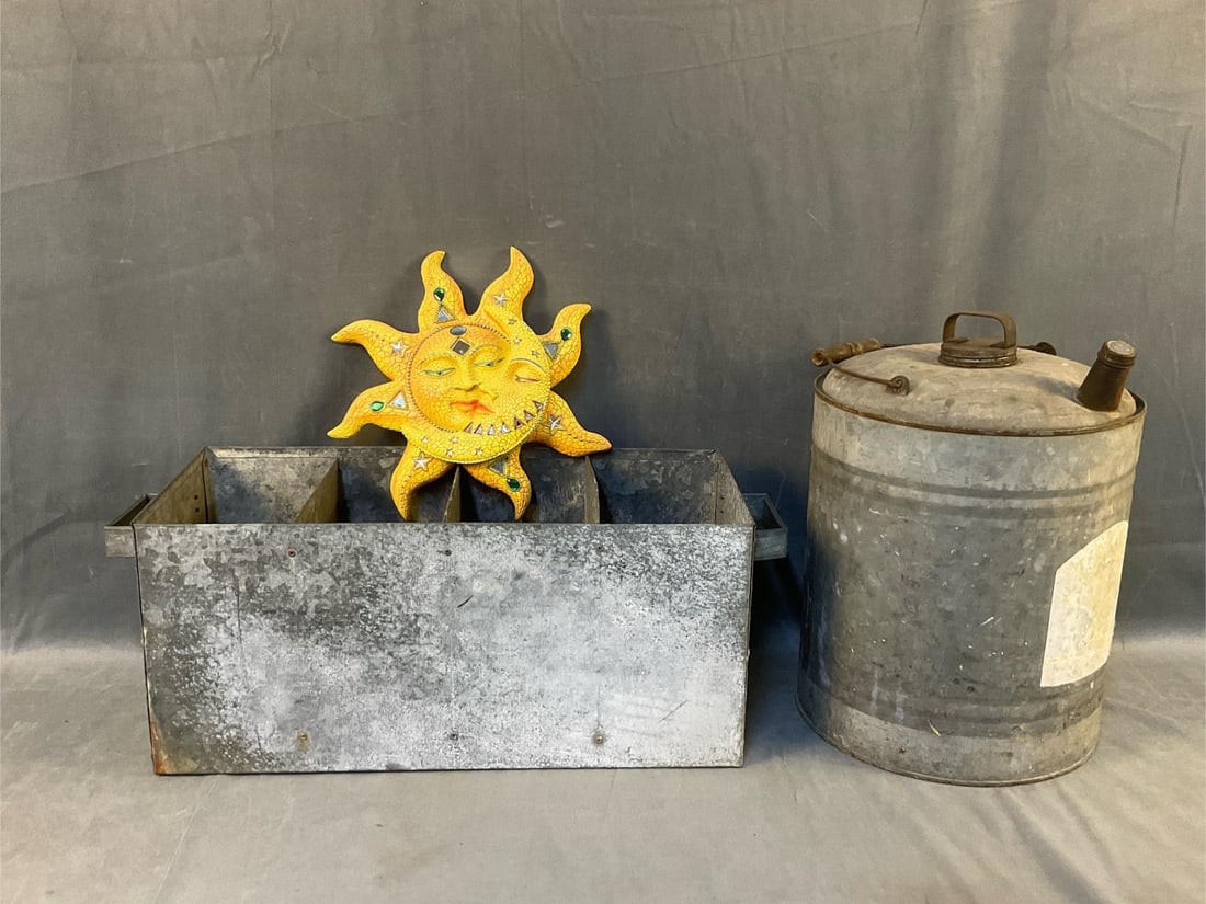 Galvanized Crate Plus: One vintage mid-20th century galvanized tin four section crate/carrier with handles. Good condition. One vintage mid-twentieth century five gallon kerosene can with wooden handle. Dented top and