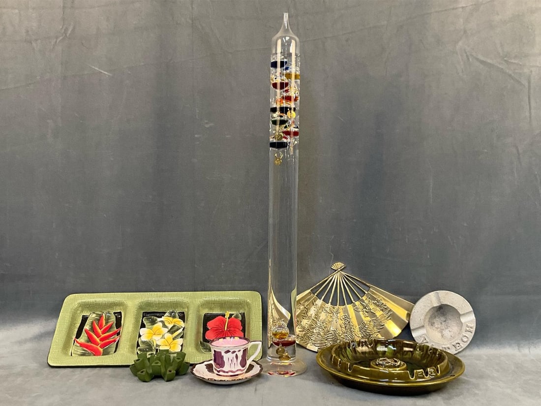 Assorted Vintage: Lot of eight assorted twentieth century vintage items. One twenty four inch Galileo hand blown glass thermometer with a paper label marked "Handmade in Germany". One brass oriental fan, one aluminum
