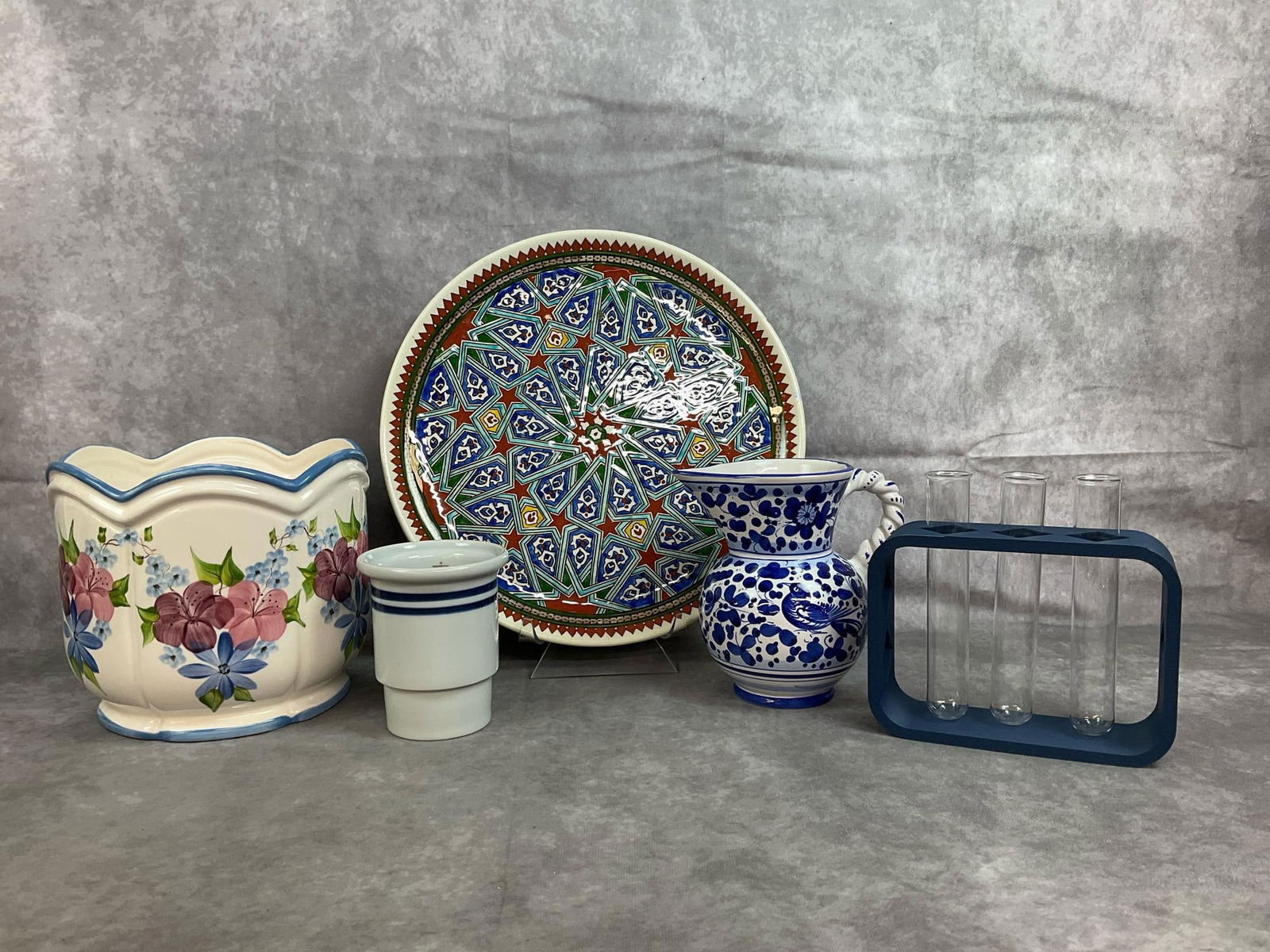 Ceramic Collectibles: Hand painted ceramic plate from Turkey, ceramic California pottery planter signed by Vee Jackson, and Deruta pitcher in Arabesco pattern. Also includes Dansk ceramic holder and acrylic and glass test