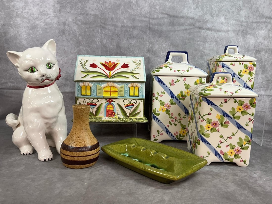 Ceramic Finds: Three piece floral canister set, Fitz and Floyd Glenbrook Cookie Jar, drip glaze ash tray, Andrea cat by Sadek, and Pottery Craft bud vase. Cat has a small chip on one ear. Otherwise items in good con