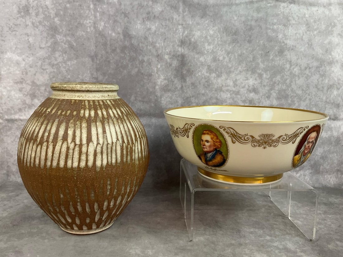 The Patriots Bowl & Glazed Vase: Patriots Bowl by Lenox featuring portraits of five patriots framed and linked with 24 karat gold floral garlands. Lot includes an incised drip glaze vase, signed by artist. Both in good condition.