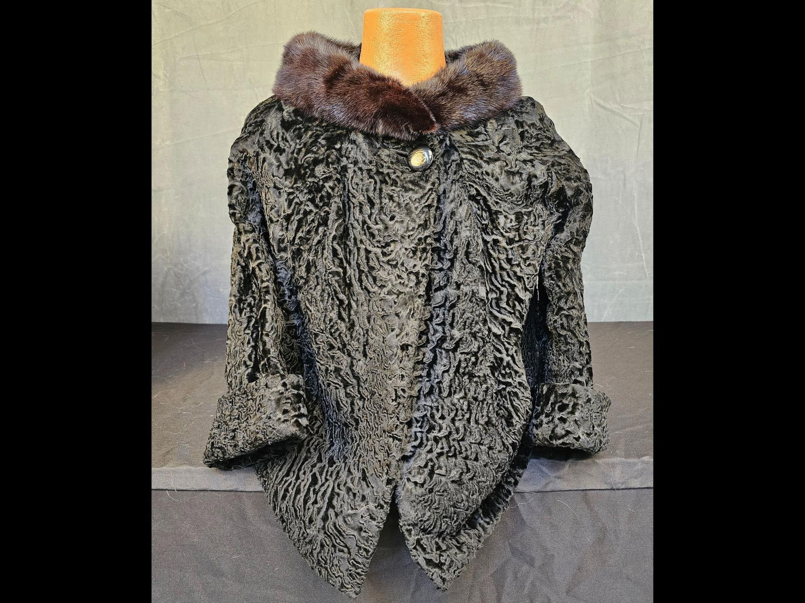 Lambs Wool Fur Coat: Vintage Persian lambs wool cropped jacket with mink collar. Two external pockets, button closure. Good condition. No label or size.