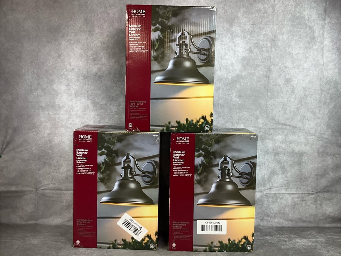 New Wall Lanterns: Three unopened new medium exterior wall lanterns from Lake Worth Collection and Home Decorators Collection. Oil rubbed bronze finish with metal shade. Model # 305 104. New condition , unopened boxes.