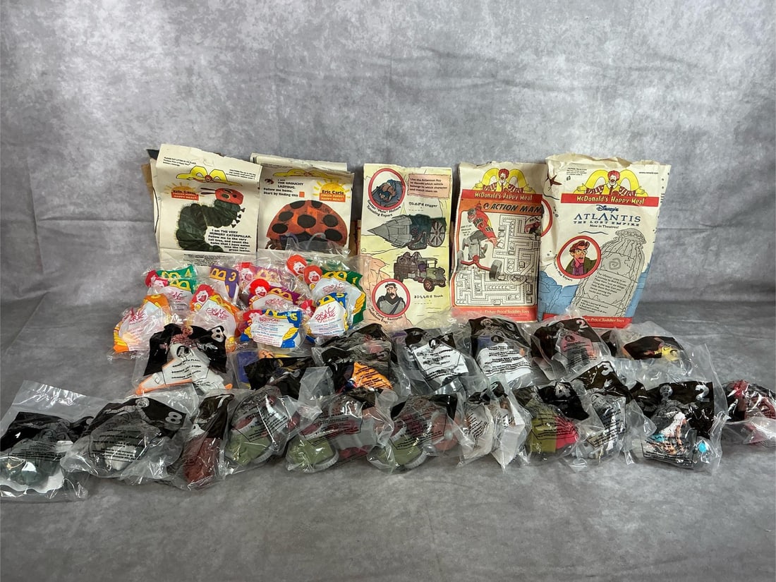 McDonal's Toys- Eric Carle, Atlantis, & Action Mann: Thirty-three toys and 12 bags from 1996 to 2001. Includes 10 Action Man by Hasbro, 12 Disney's Atlantis figures, 11 Eric Carle "bugs", and McDonald's bags. McDonald's toys are in original packaging.
