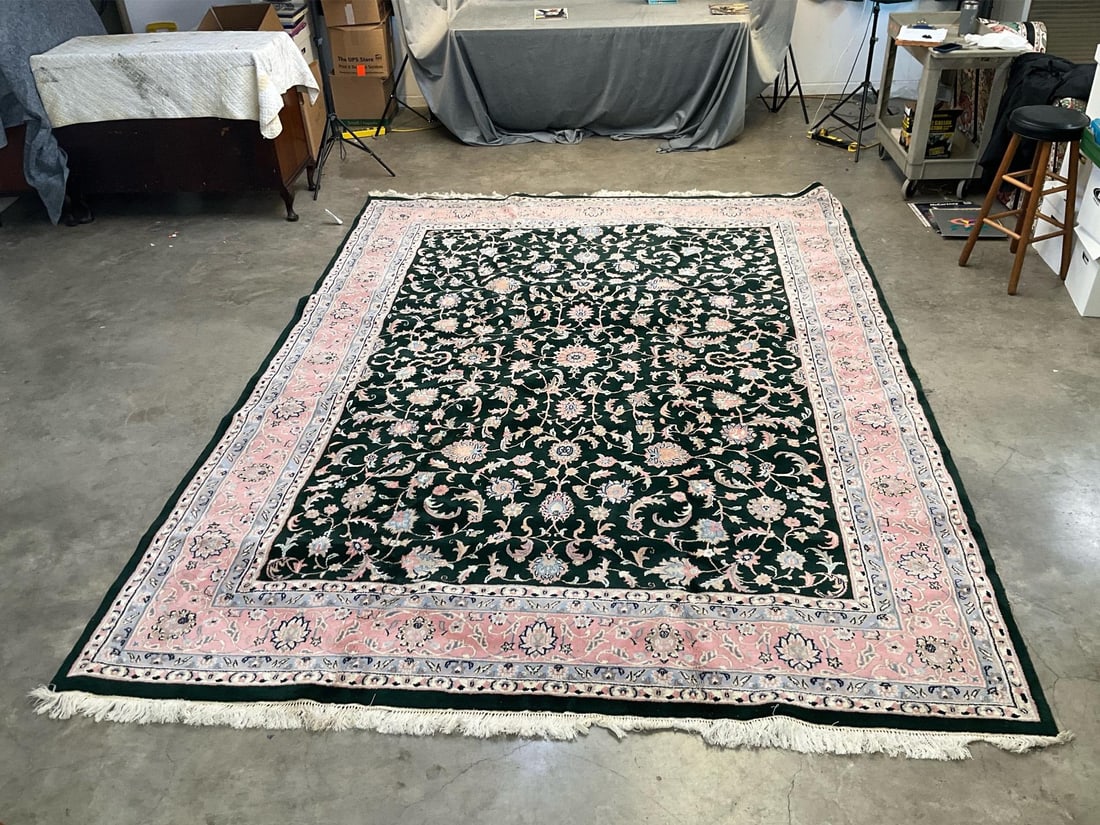 Indo Keshan Carpet: Late twentieth century vintage Indo Keshan carpet with floor/carpet pad. Signs of wear commensurate with age and use. Good condition. Measures 107.5 inches width x 142 inches length.