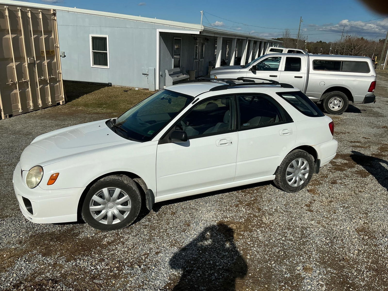 Subaru 2002 Impreza Four Door Hatchback Wagon: 2002 Subaru Impreza 2.5 TS four door white hatchback wagon. Includes working Alpine AM/FM stereo with CD player (not tested). Keyless entry, power windows, working AC. Cruise control lever loose and